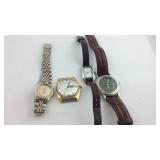 Watch lot, three wrist watches and a watch head