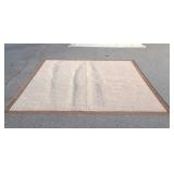 Area rug, with braided center and brown border,