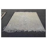 Green oriental rug, is faded but still a nice rug