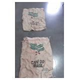 Two burlap bags, used to haul coffee both have
