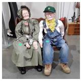 Maw and paw porcelain dolls with bench, 24 inches