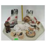 Figurines - seven dog shaped and one candle jar