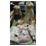 4 Porcelain dolls & doll clothing - includes two
