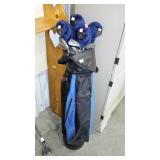 Set of Lynx golf clubs with bag and some covers.