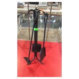 Black fireplace set on small stand