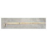 Walking stick with brass horse head, head has