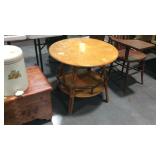 Sunroom table with secondary shelf and rattan legs