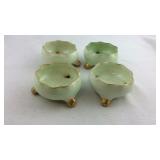 Four matching salt dips