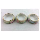 Three floral design salt dips