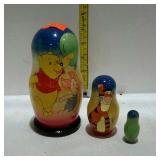 Russian style nested Winnie the Pooh dolls
