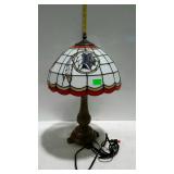 Slag glass Redskins table lamp with antiqued brass