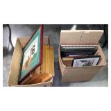 Two boxes of mostly certificate frames.