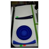 Two cutting boards. One is over sink style with