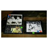 Two sports theme plaques have certificates and