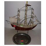 Home decor, pewter Eagle plate, and a tin ware