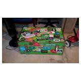 Footlocker trunk, green in color with lots of