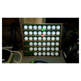 Golf ball display rack with golf balls - 17 x 15
