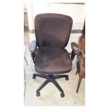 Office chair with black fabric and vinyl arms