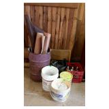 Group lot: small burn barrel with some rolls of