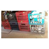 Group lot of plastic milk crates, some do have