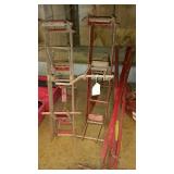 Three scaffolding Buck Jacks with some braces