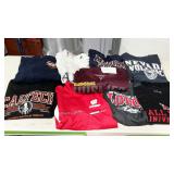 Nine college sweatshirts and light jackets, all