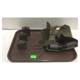 Traylt with three bottles of cleaner rifle bore/