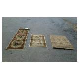 Group of three flower pattern rugs one is a