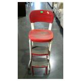 Vintage Cosco style kitchen stool. Shows wear