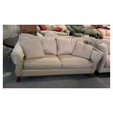 Thomasville two cushion sofa. Flared arms. Subtle