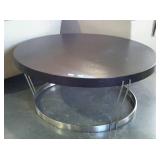 Stainless base and wood topped, coffee table. 42"
