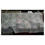 Summer weight bed topper quilt. Tufted. Some