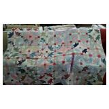Patchwork quilt. Multi patterned fabrics. Some