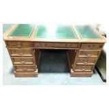 Seven drawer knee hole desk 56 by 26 by 30
