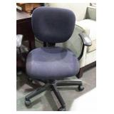 Office chair with black upholstery, and vinyl arms