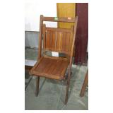 Single vintage wooden folding chair.