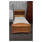 Twin size bed. Complete. Bookcase headboard,