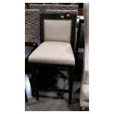 Single upholstered barstool from model home.