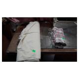 Two rolls of fabric