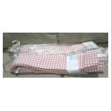 Pink and white checkered curtains, lined with