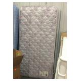 Twin size mattress and box spring set shows dirt