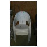 Four plastic chairs