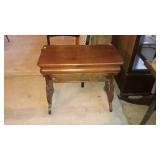 Foyer table with undershelf. A few surface cracks