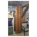 Two tall CD/DVD towers with adjustable shelves.