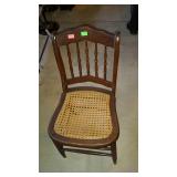 Single cane side chair. Spindle back. Needs some
