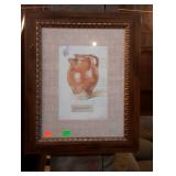 Framed print of a vase 19 by 23