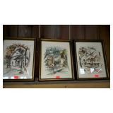 Print trio with village street scenes, framed -