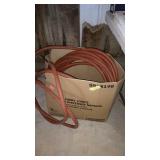 Red rubber hose, and misc garden tools