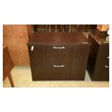 Two drawer lateral file cabinet. No key.