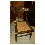 Single side chair. Cane seat with spindle back.